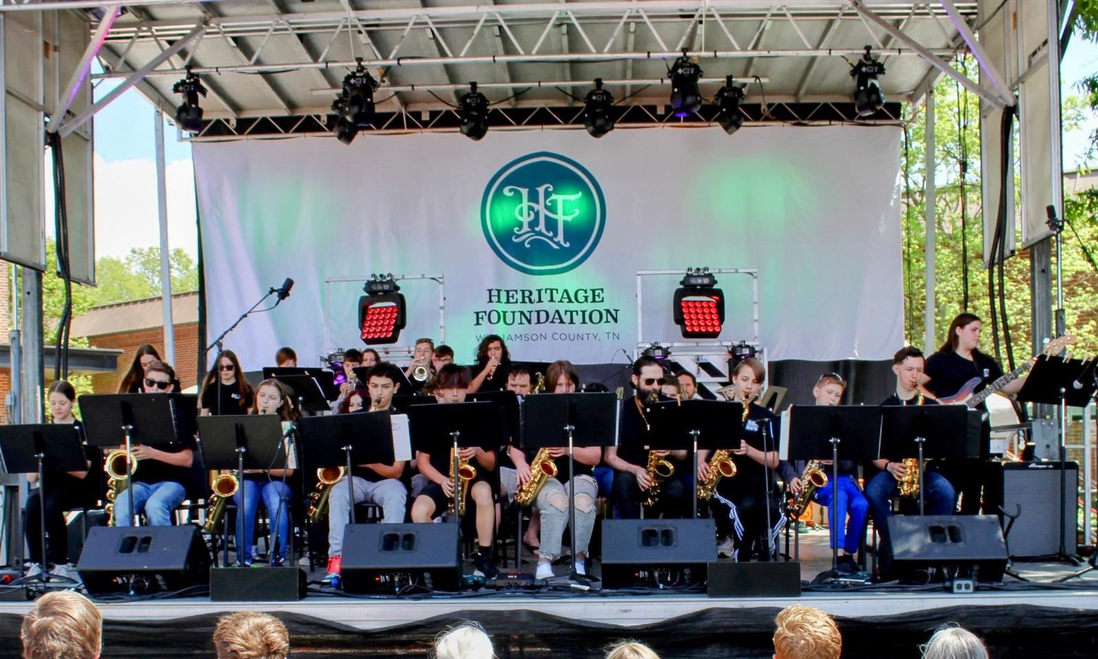 Students perform onstage